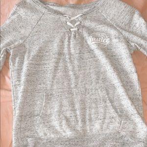 grey criss cross sweatshirt
